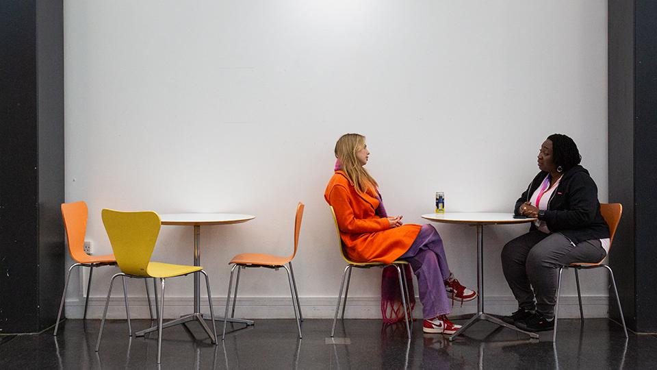 Students in the Professor Stuart Hall Building