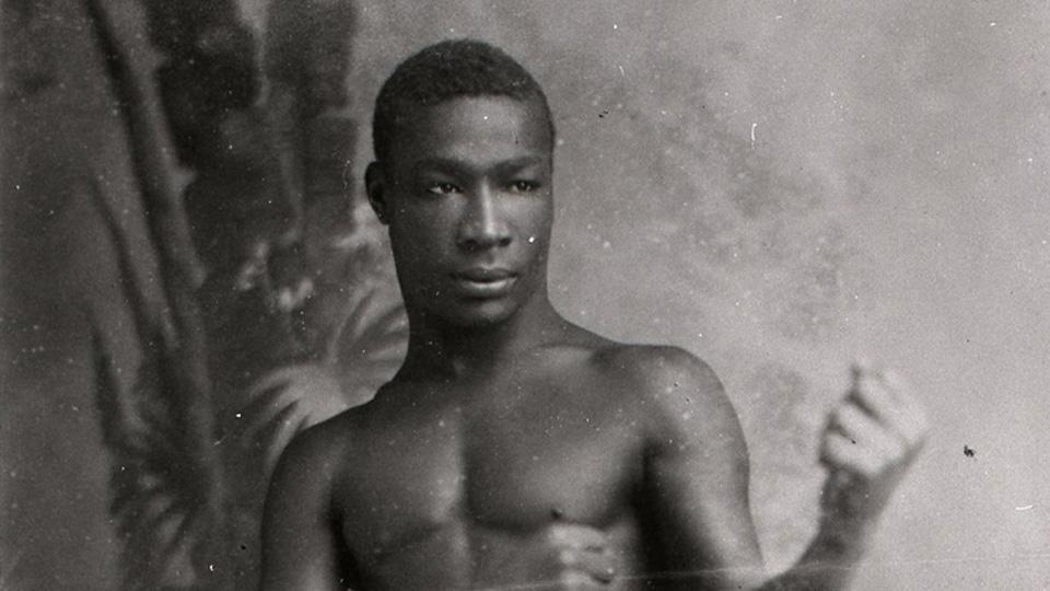 Black and white photograph of boxer Ching Hook 