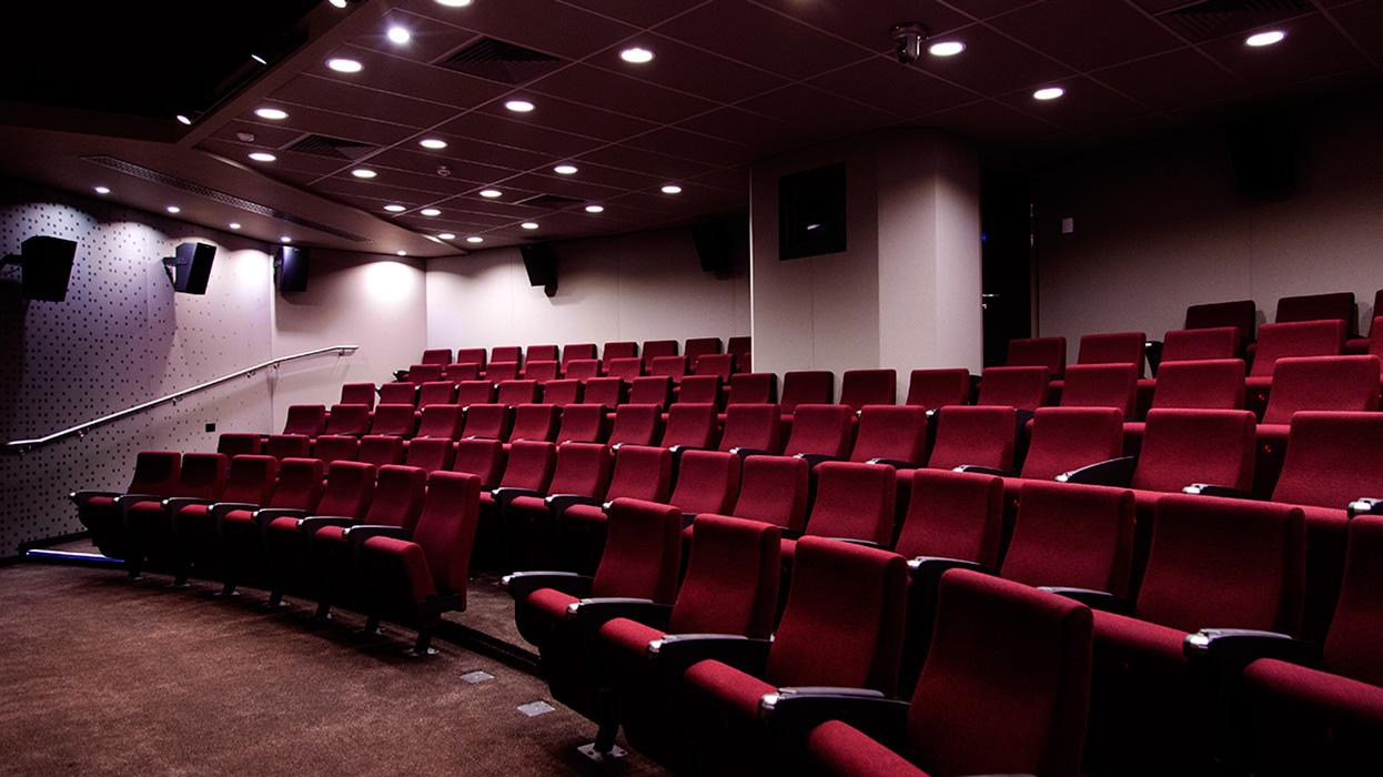 The red seats in the cinema on campus at Goldsmiths