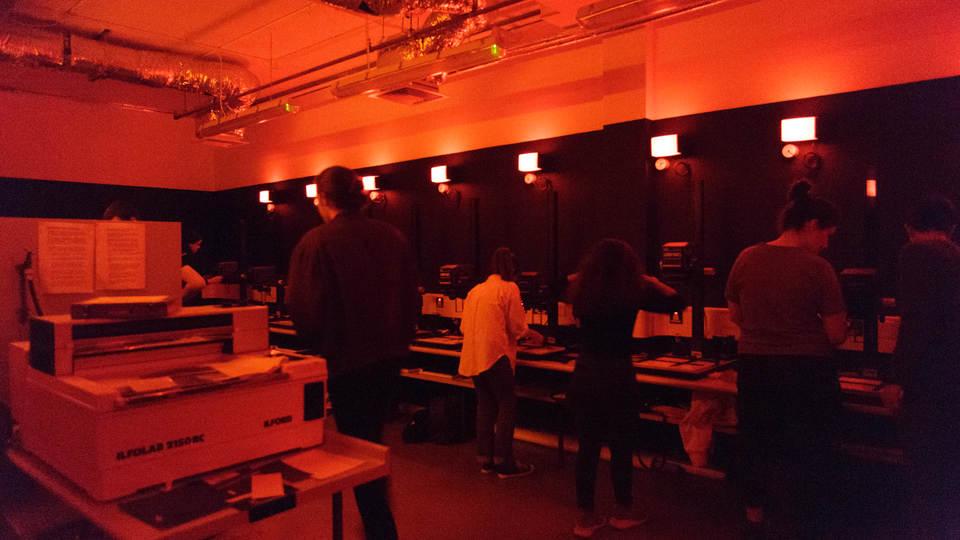 Studios working in a photography dark room