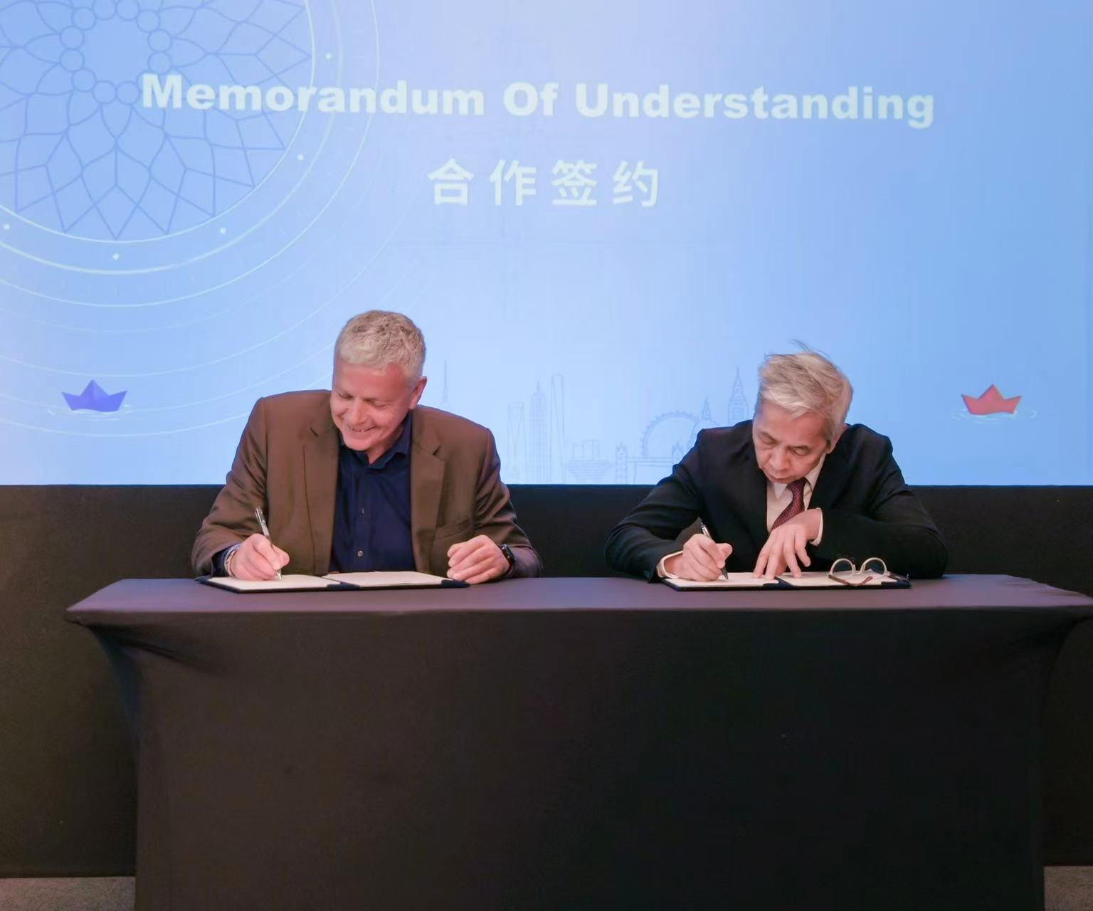 Professor David Oswell, Goldsmiths' Provost and Deputy Vice-Chancellor, and the chair of MoCA Shanghai Samuel Kung at the MOU signing