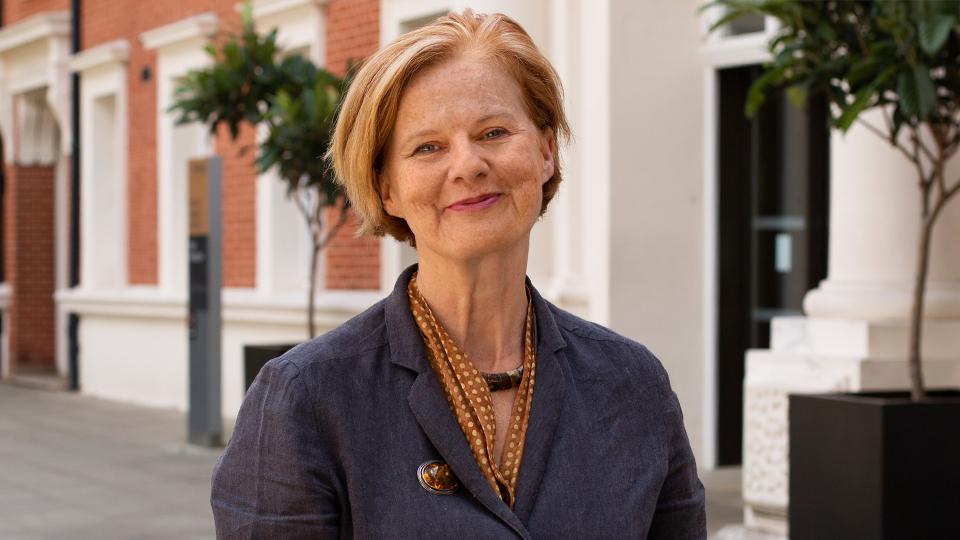 Portrait of Dinah Caine outside the Richard Hoggart Building 