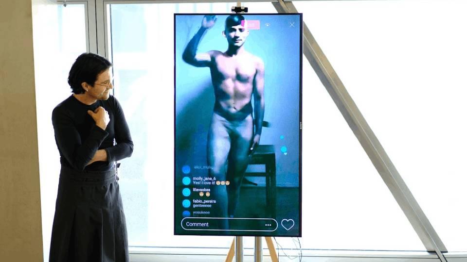 Student considering artwork