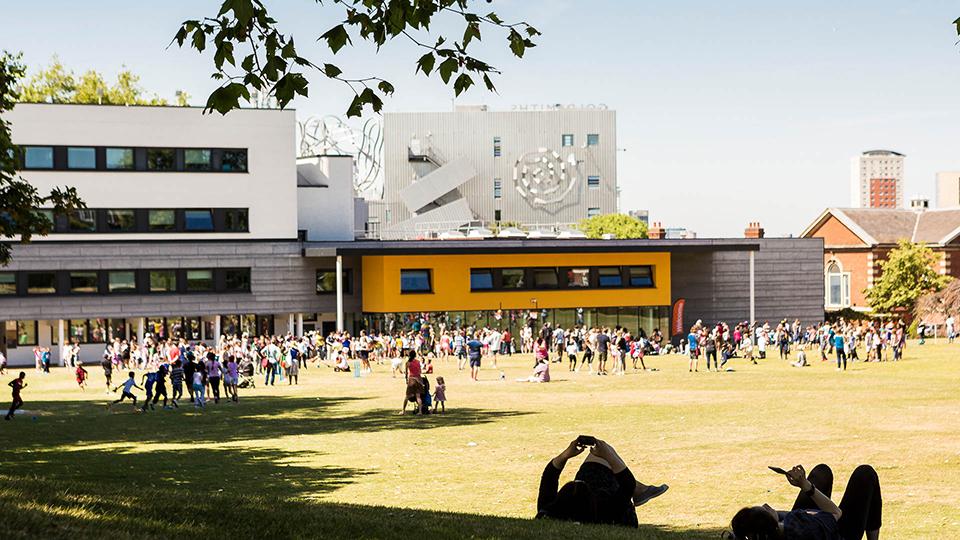 Students on the college green outside the Whitehead Building