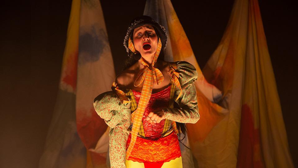 A student performing in the George Wood Theatre