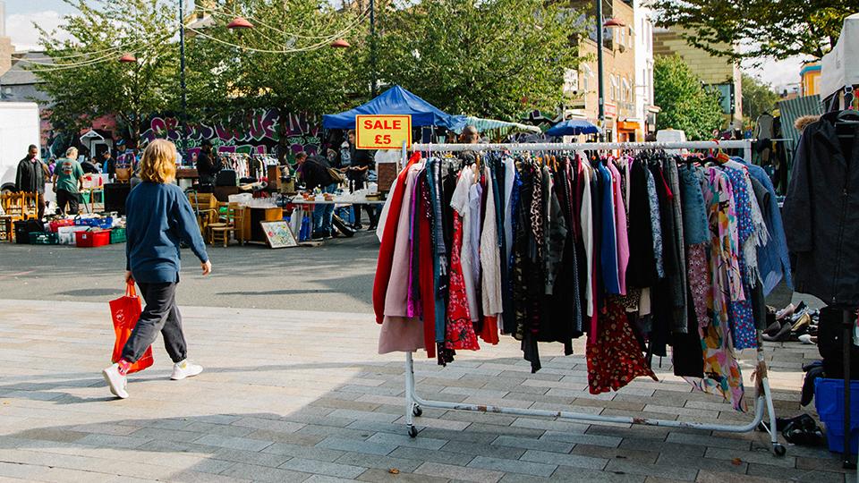 A rail of clothes at Deptford Market