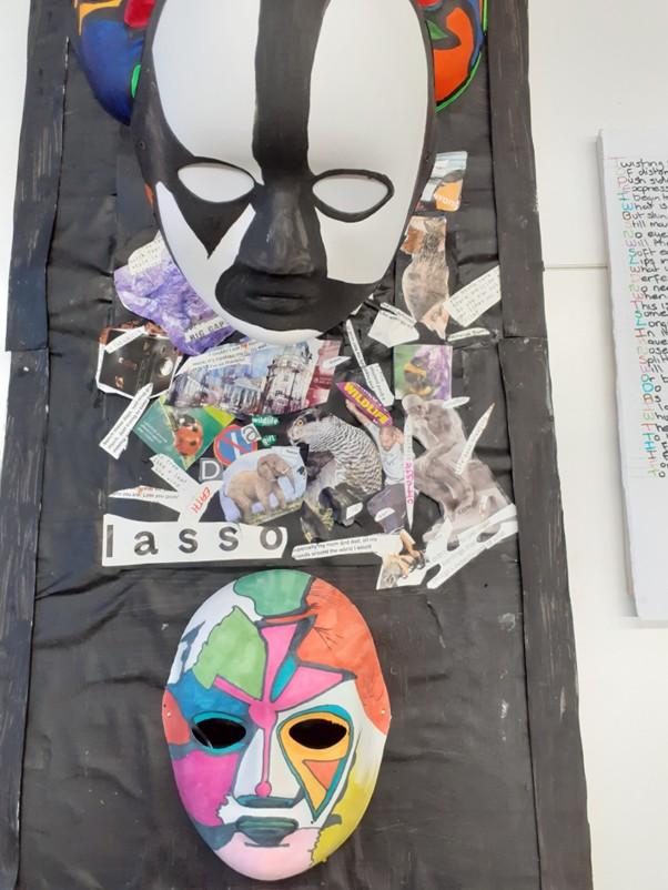 This is a mixed media art piece completed by Carly, using masks, paint, magazines. It's part of a series of work Carly has been working on.