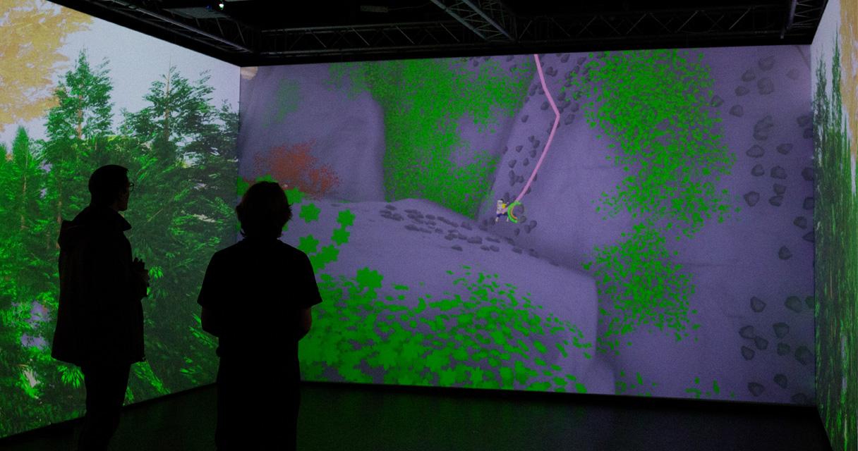 Two silhouette figures infront of an immersive game