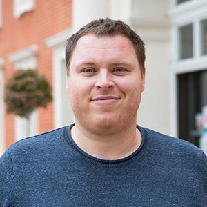 A student at her desk in her flat