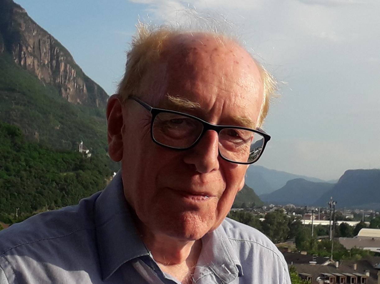 A portrait photograph of Peter Smith