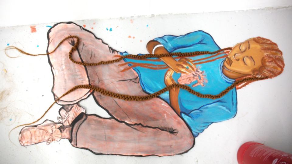 Colourful chalk figure created during Goldsmiths’ Art Summer School.