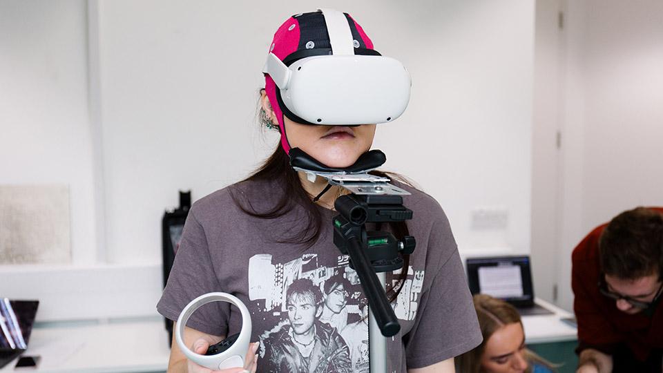 A student wearing a VR headset.