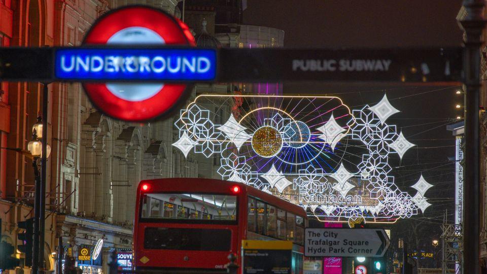 Ramadan Lights display lit up and the underground sign