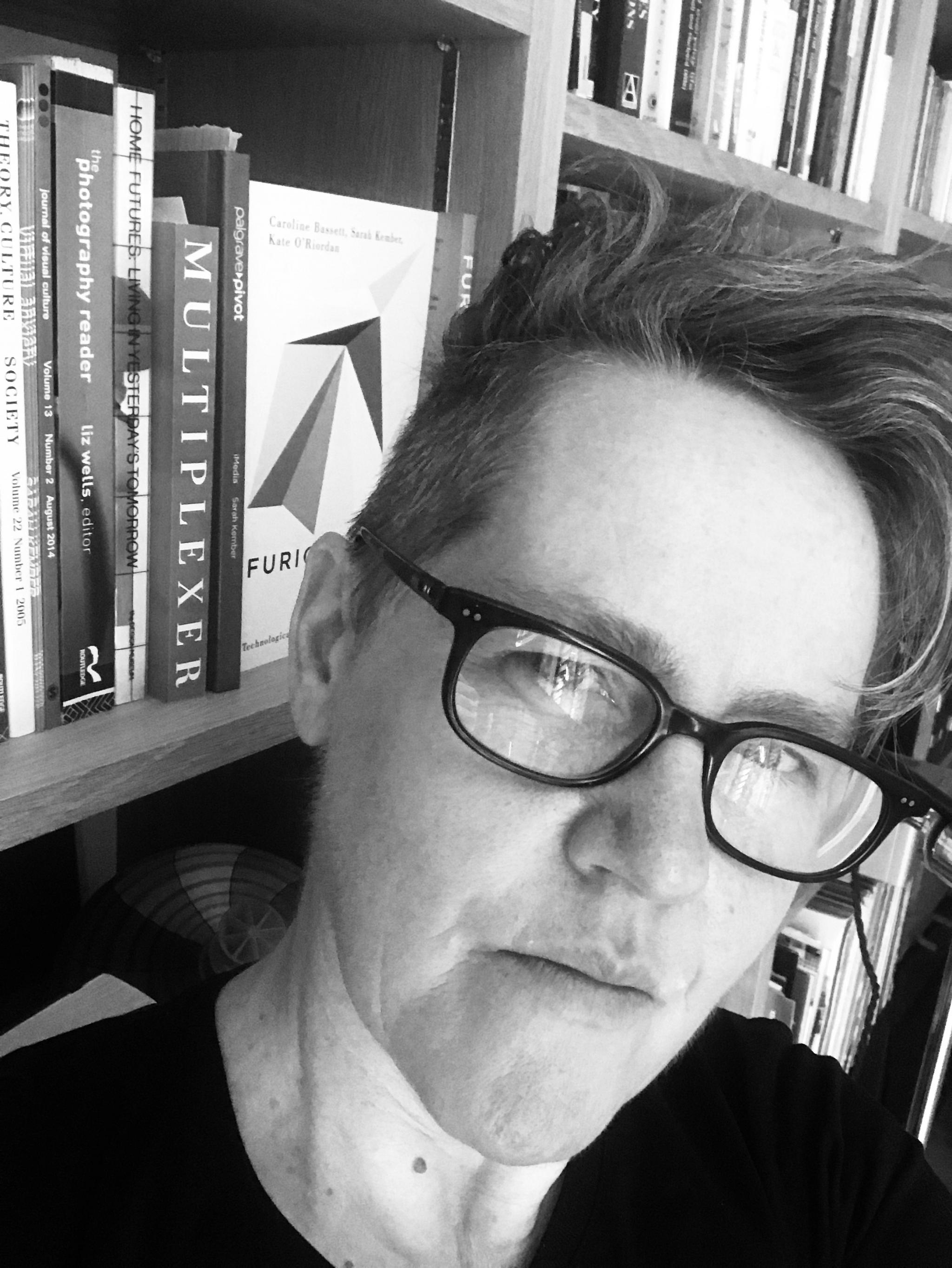 A picture of Sarah Kember in her office at Goldsmiths.