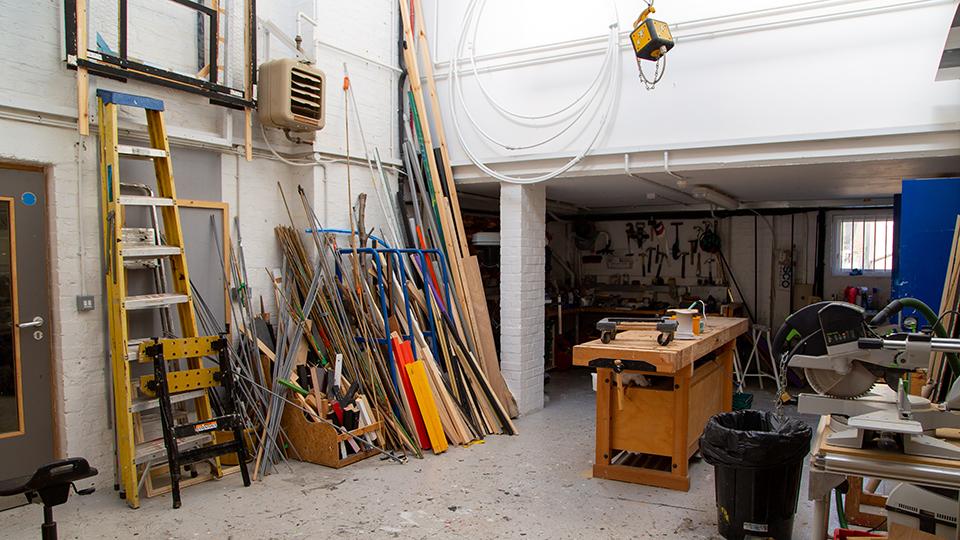 Ladders and other equipment in workshop