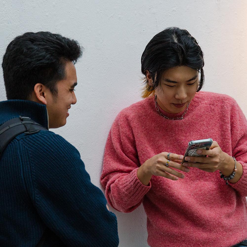 Student looking at a phone