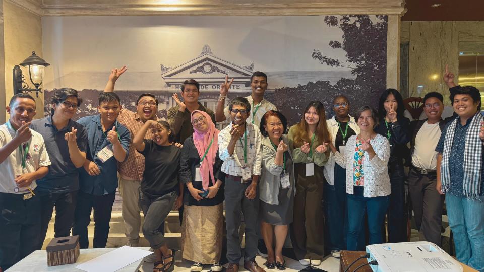 Young people pose for group portrait